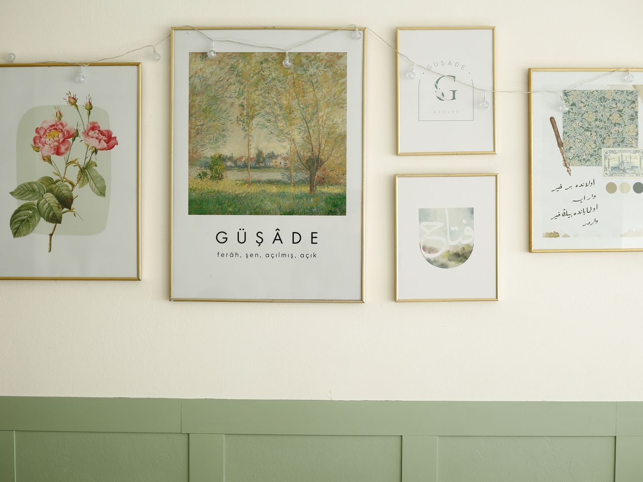 A curated gallery wall of framed prints hung in a bright living room